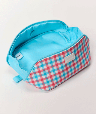 red, white, and blue, make up bag on white background